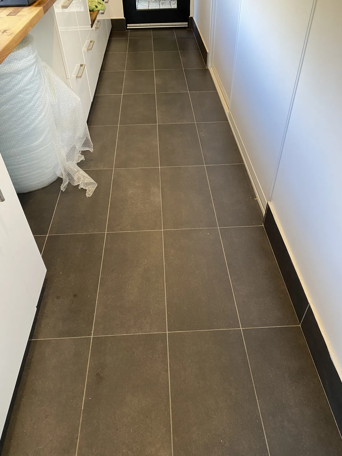Cluttered wet area before